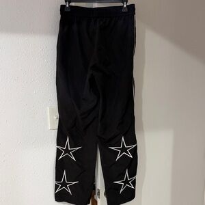 Black Pants with White Star Accents